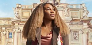 Serena Williams in brown jacket and blouse