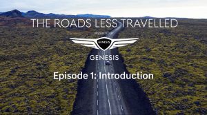 Genesis branding with road and landscape imagery