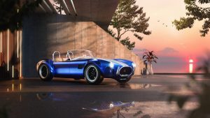 Cobra C300 Roadster electric vehicle parked in front of a sunset